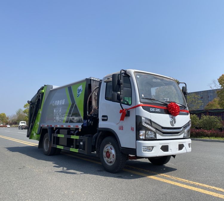 東風壓縮垃圾車小區(qū)學校收集生活垃圾專用車輛